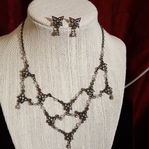 Danty butterfly necklace and earring set.